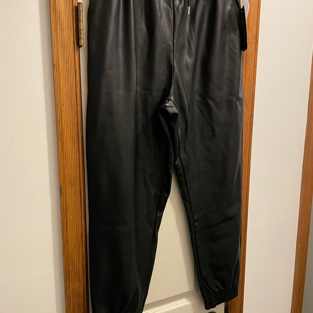 Faux leather drawstring waist joggers with elastic band at ankle